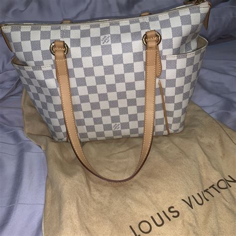 louis vuitton white checkered bag.